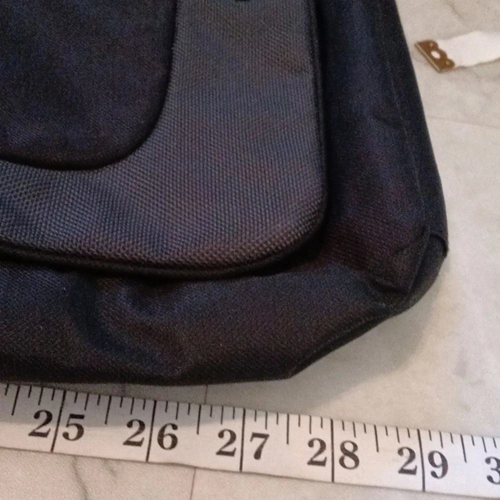 Tumi Black Laptop Messenger Bag.